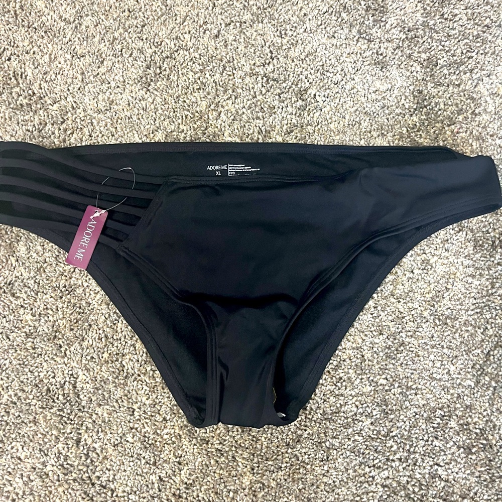Adore Me black bikini bottoms 🖤 with a little sass of straps on one side.